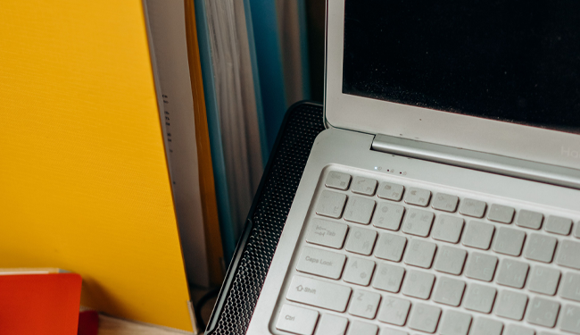 laptop with colourful files