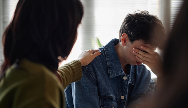 young person being consoled